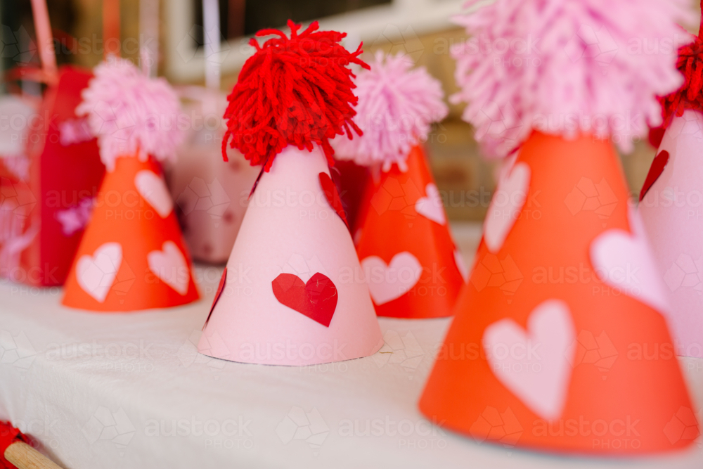 Part Hats- horizontal, red and pink - Australian Stock Image