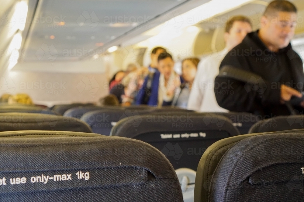 Passengers boarding the plane - Australian Stock Image