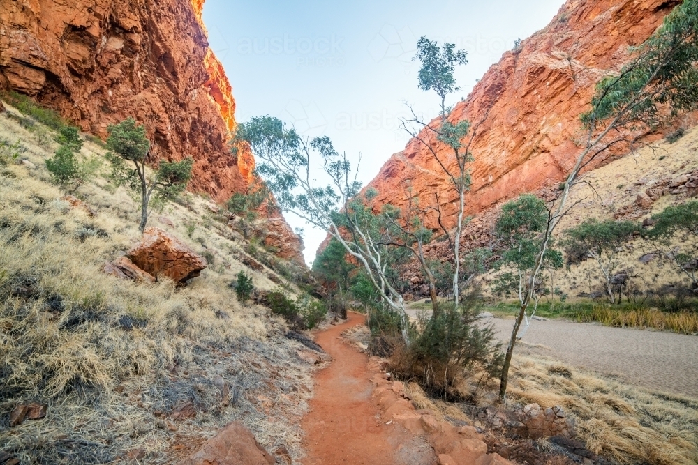 Pathway among red rock at National Park Ranges - Australian Stock Image