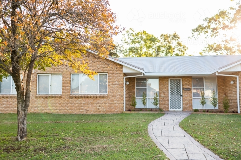 pathway to front door of home in afternoon - Australian Stock Image