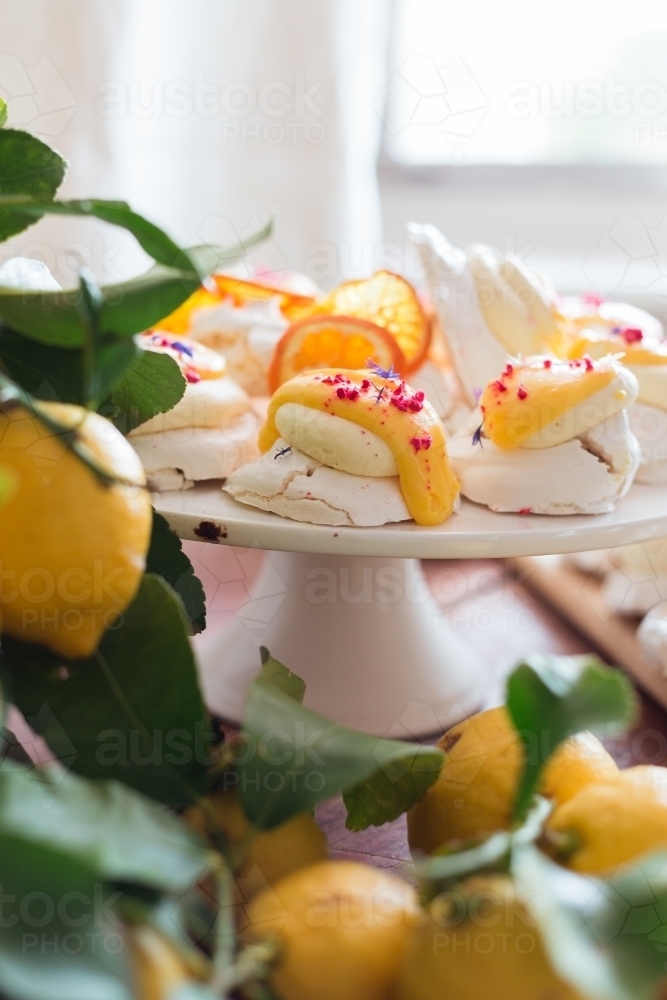 Pavlovas styled on a cake stand - Australian Stock Image