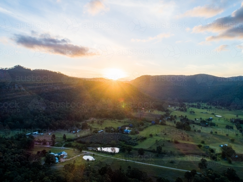 Peaceful aerial view of sunset behind Bulga hills in Hunter valley - Australian Stock Image