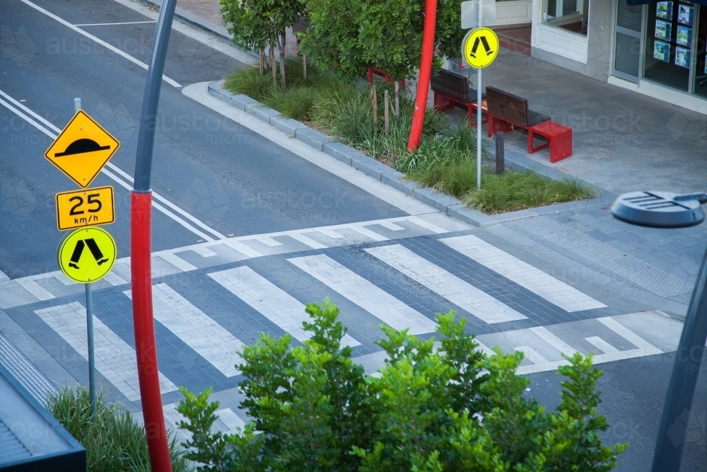 Pedestrian crossing on a speed hump on urban street - Australian Stock Image
