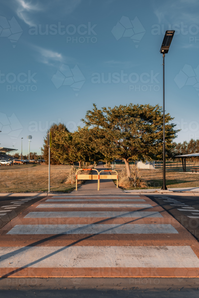 Pedestrian Crossing over road in community sports complex - Australian Stock Image