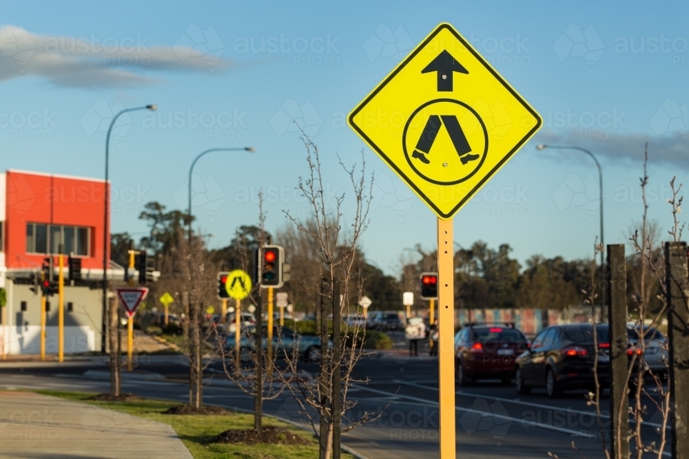 Pedestrian crossing sign on suburban street - Australian Stock Image