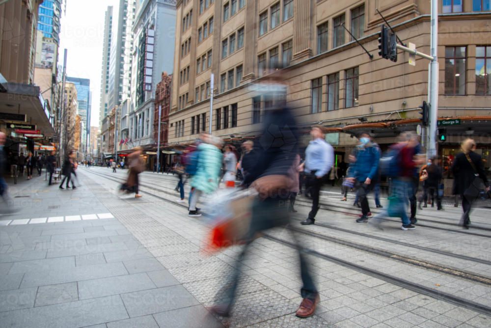 Pedestrians crossing George Street light rail tracks - Australian Stock Image
