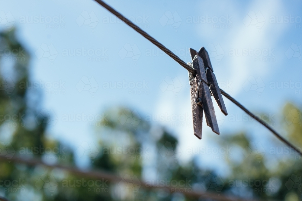 Pegs on clothesline - Australian Stock Image