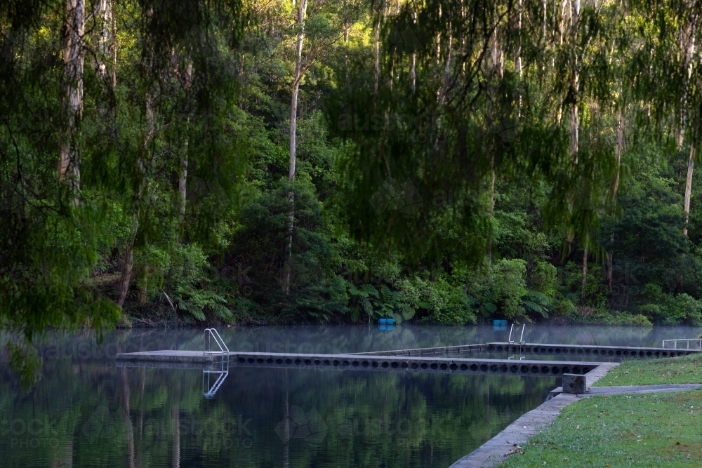 Pemberton Pool with still water reflecting trees : Austockphoto Pemberton Pool with still water reflecting trees - Australian Stock Image