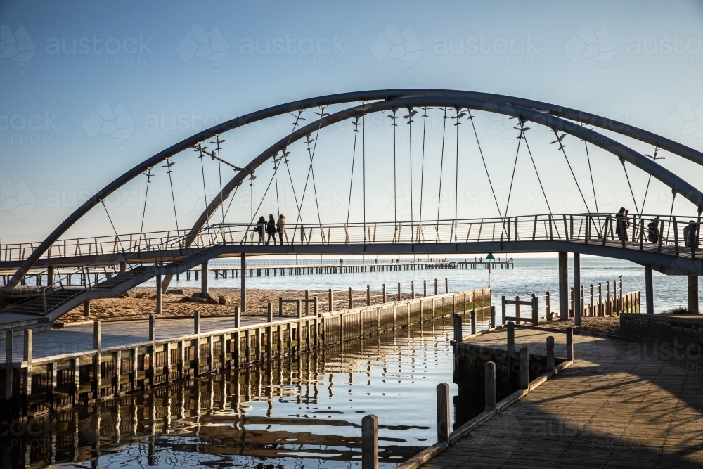 People crossing the Mile Bridge - Australian Stock Image