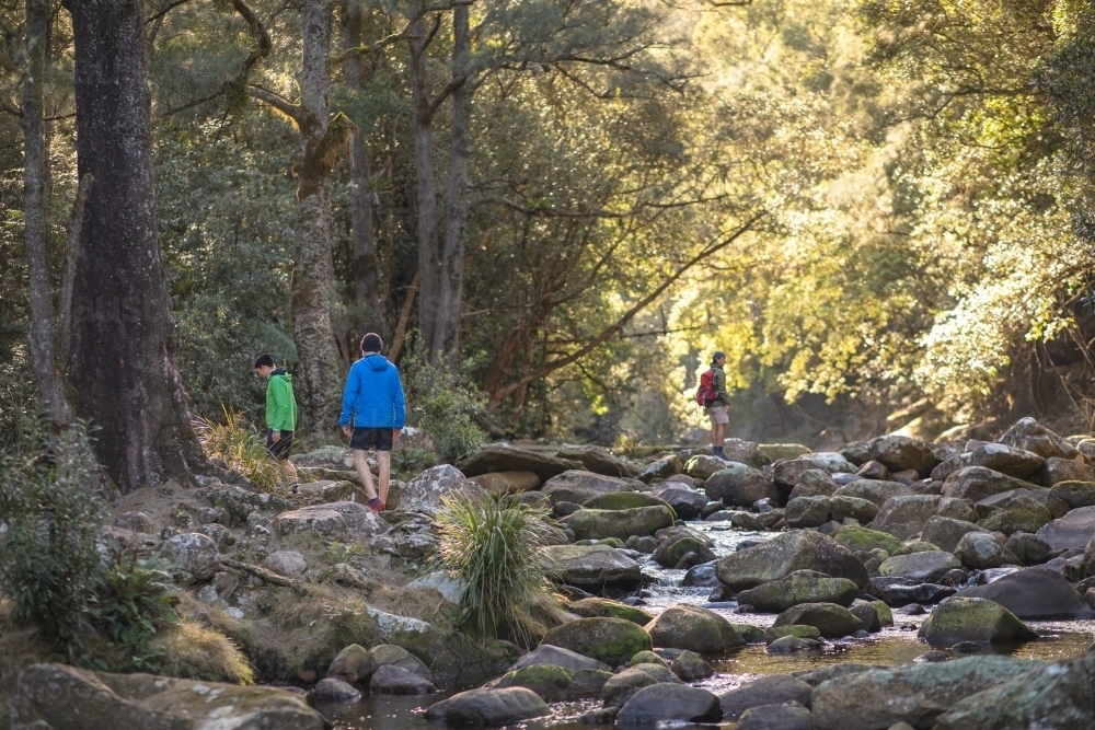 People exploring quiet river - Australian Stock Image