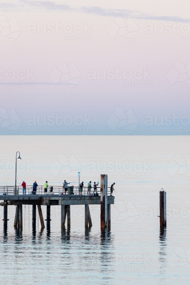 people fishing at dawn - Australian Stock Image