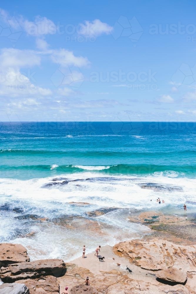 People in the rockpools between Tamarama and Bondi - Australian Stock Image