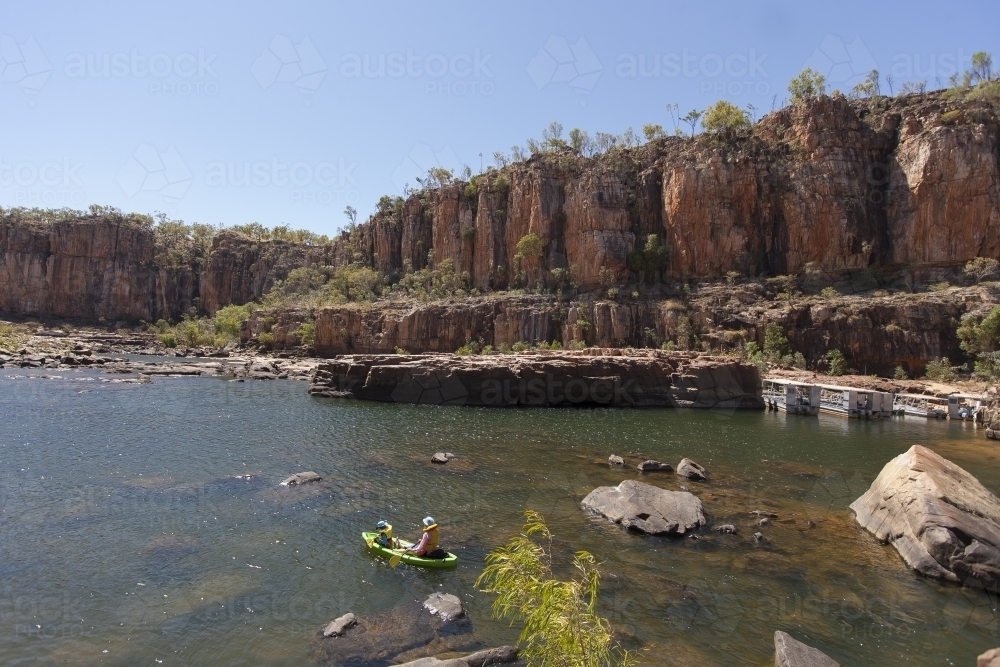 People kayaking in remote gorge - Australian Stock Image