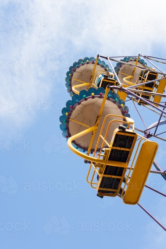 People on a ferris wheel at a city fun park - Australian Stock Image
