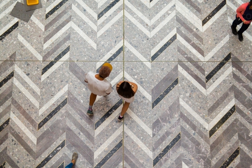 People seen from above walking in a shopping mall - Australian Stock Image