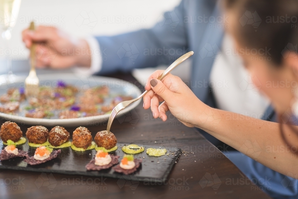 People Sharing Food in Celebration - Australian Stock Image