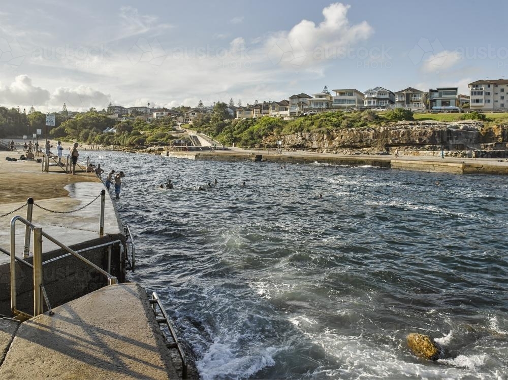 People swimming at Clovelly Ocean pool - Australian Stock Image