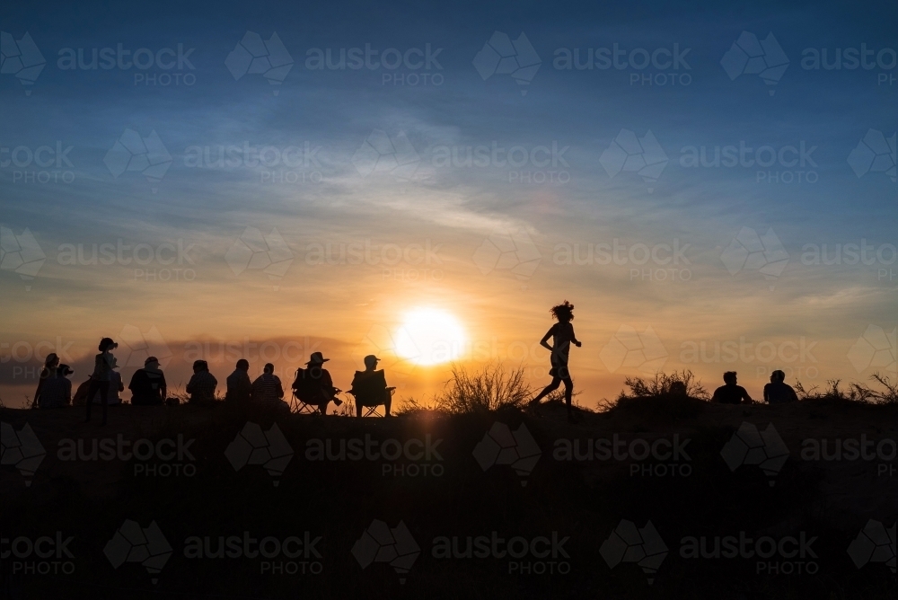 People watching the sunset at Mindil Beach Markets in Darwin - Australian Stock Image