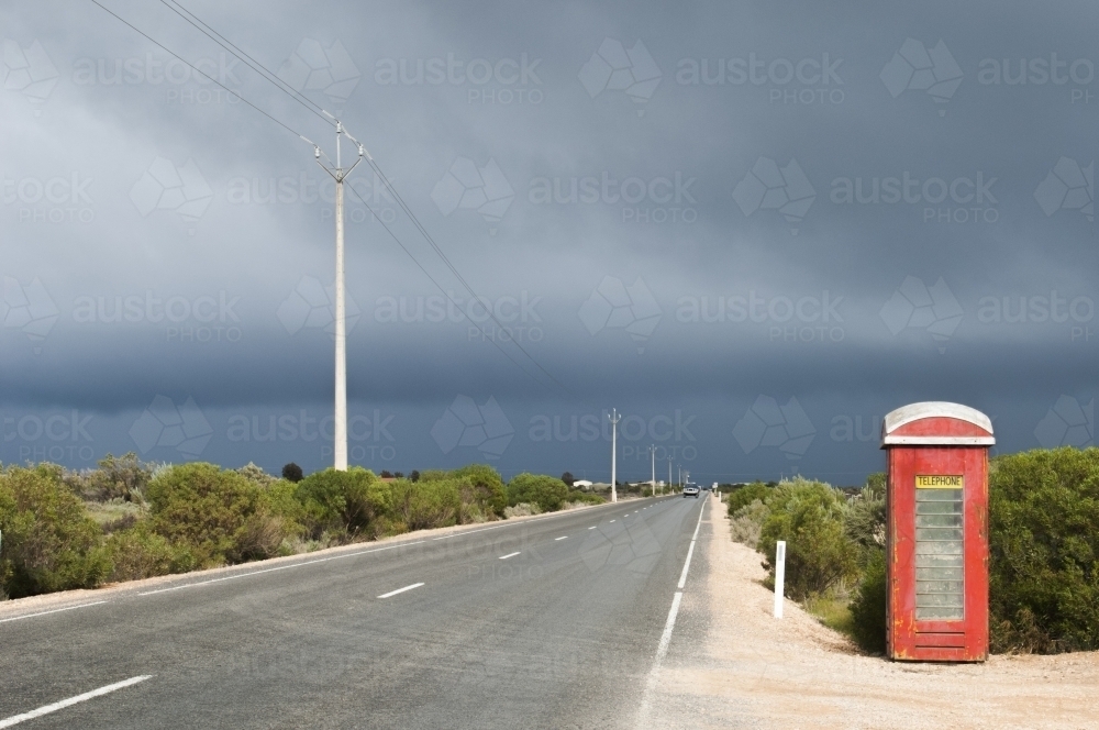 Phone box on a country road - Australian Stock Image