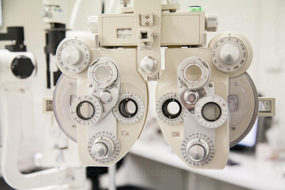 Phoropter, ophthalmic testing device in an optometrist's room - Australian Stock Image
