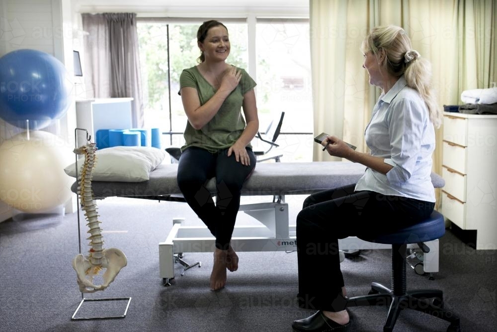 Physiotherapist assessing patient - Australian Stock Image
