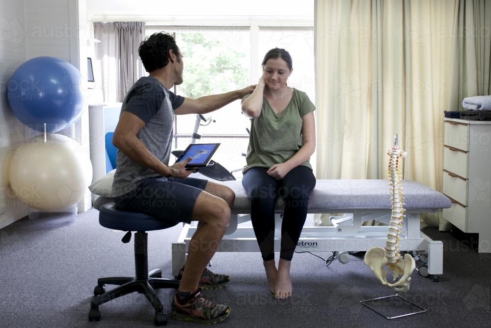 Physiotherapist assessing patient - Australian Stock Image