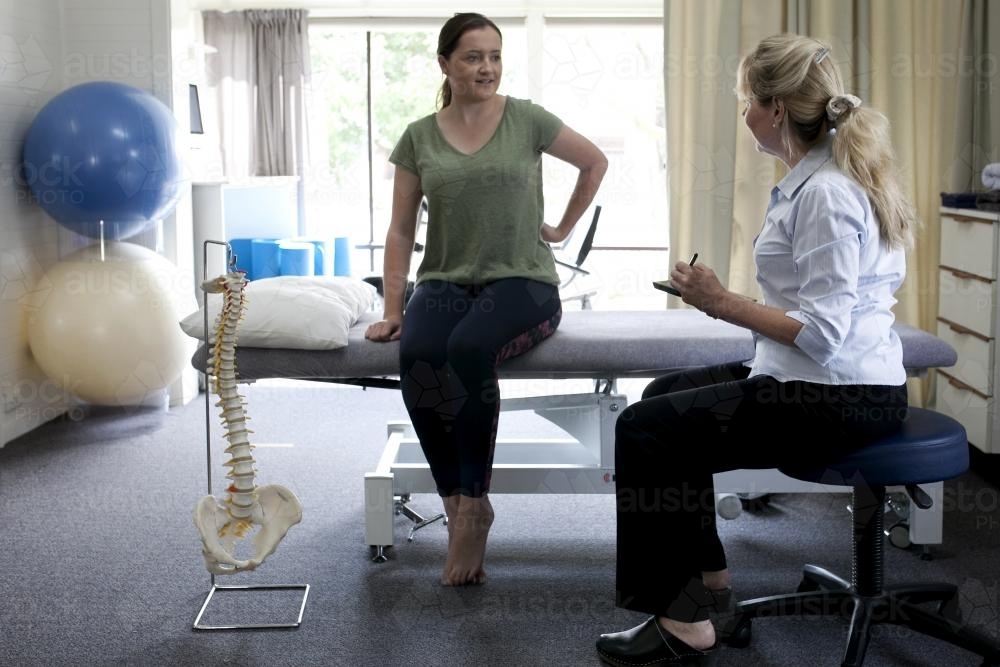 Physiotherapist assessing patient - Australian Stock Image