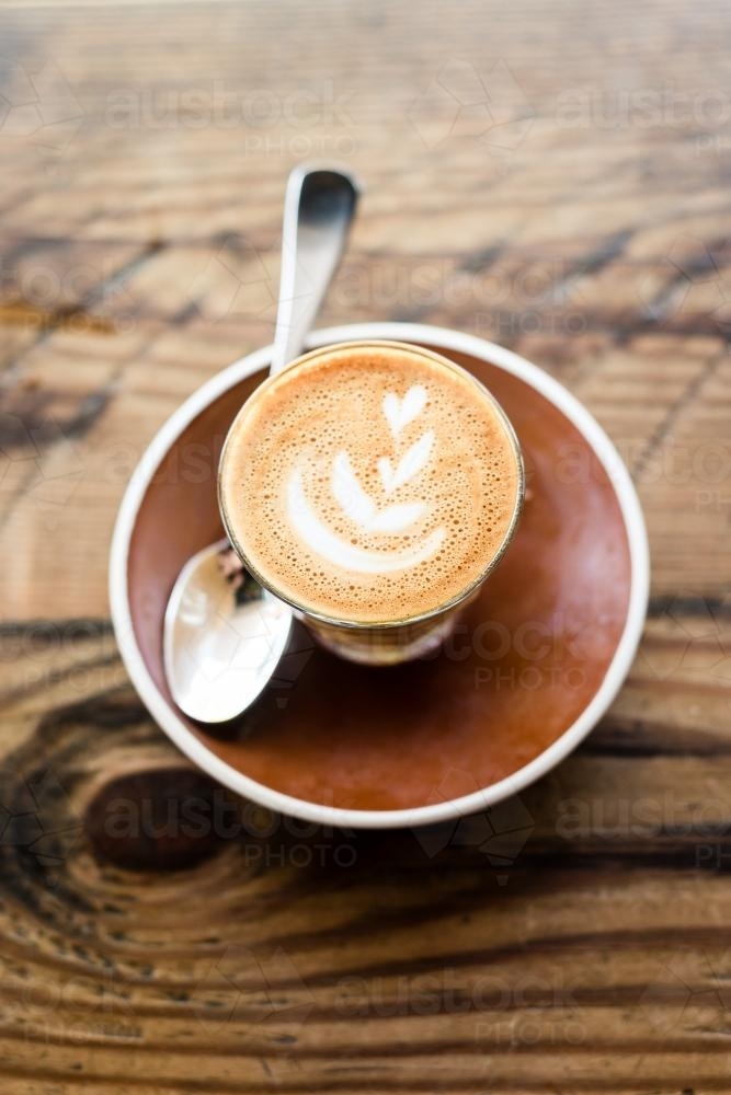 Piccolo flat white latte drink from overhead - Australian Stock Image