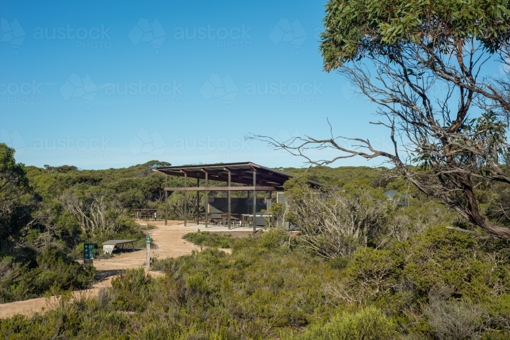 Picnic tables and shelter in bushland - Australian Stock Image