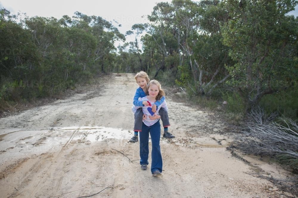 piggy back ride - Australian Stock Image