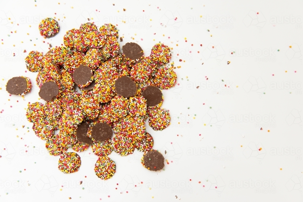 Pile of chocolate freckles with sprinkles - Australian Stock Image