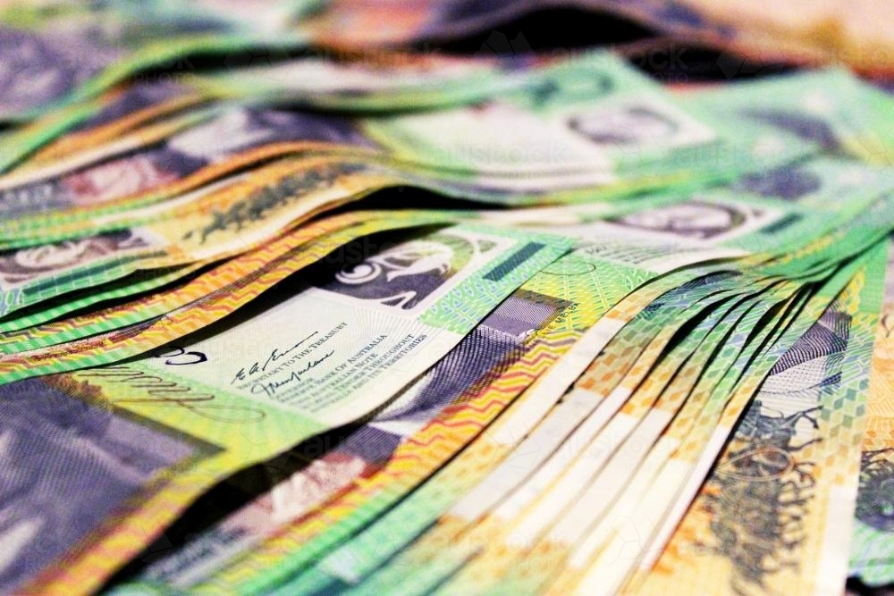 Pile of one hundred dollar notes - Australian Stock Image
