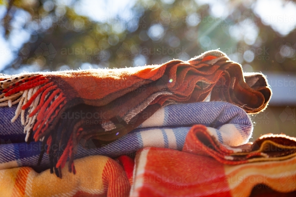 Pile of woolen blankets outside - Australian Stock Image