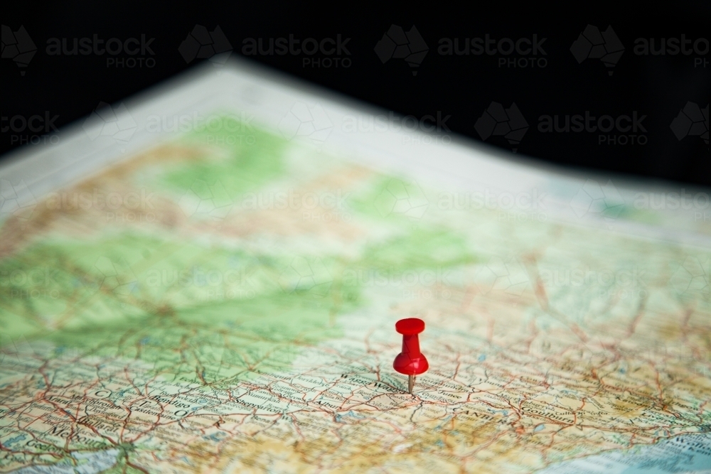 Pin marking road trip destination on map - Australian Stock Image