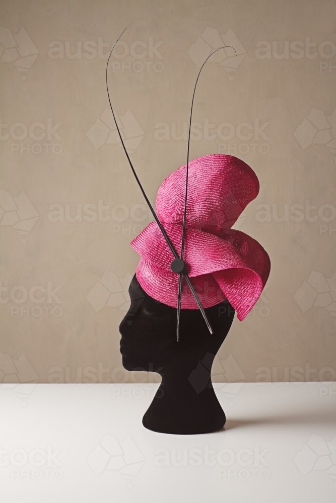 Pink and black ladies races hat for spring carnival - Australian Stock Image