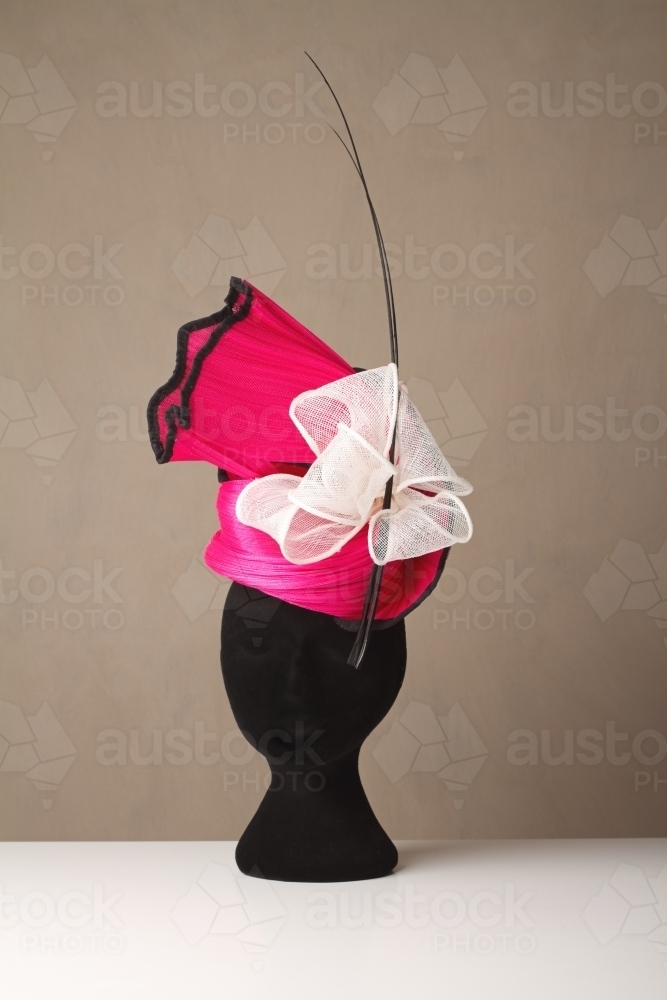 Pink and cream millinery races unique ladies hat - Australian Stock Image