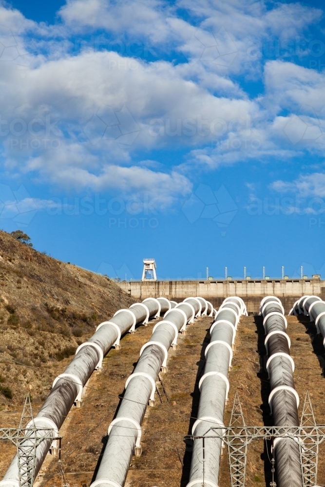 Pipes going down hill to Tumut 3 Power Station part of the snowy mountains hydroelectric scheme - Australian Stock Image