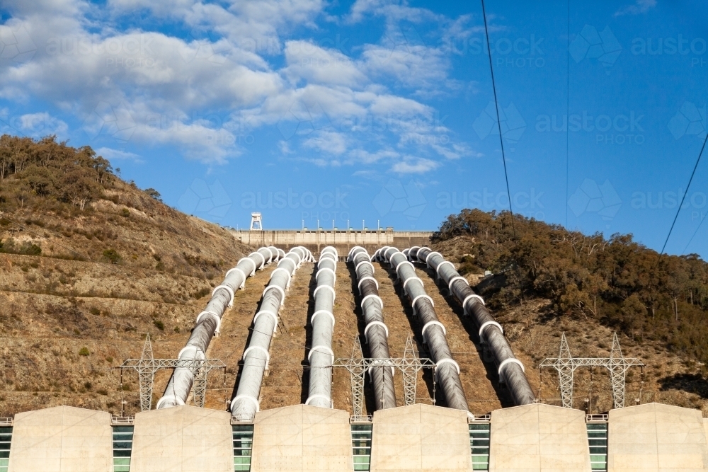 Pipes going down hill to Tumut 3 Power Station part of the snowy mountains hydroelectric scheme - Australian Stock Image