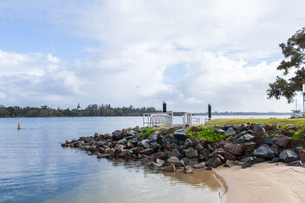 pnotoon and McInherney Park with riverside views over water of Hastings river in Port Macquarie - Australian Stock Image