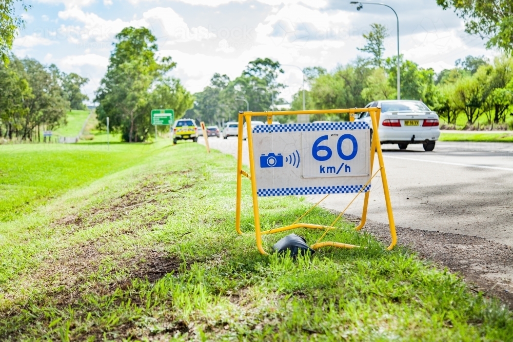 Image of Police speed camera 60 km speed zone sign beside highway ...