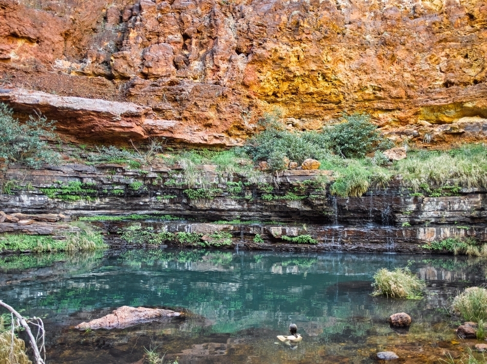 Pool and waterfall in remote location - Australian Stock Image
