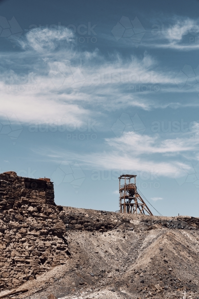 Poppet head shaft of Broken Hill with whispy clouds - Australian Stock Image