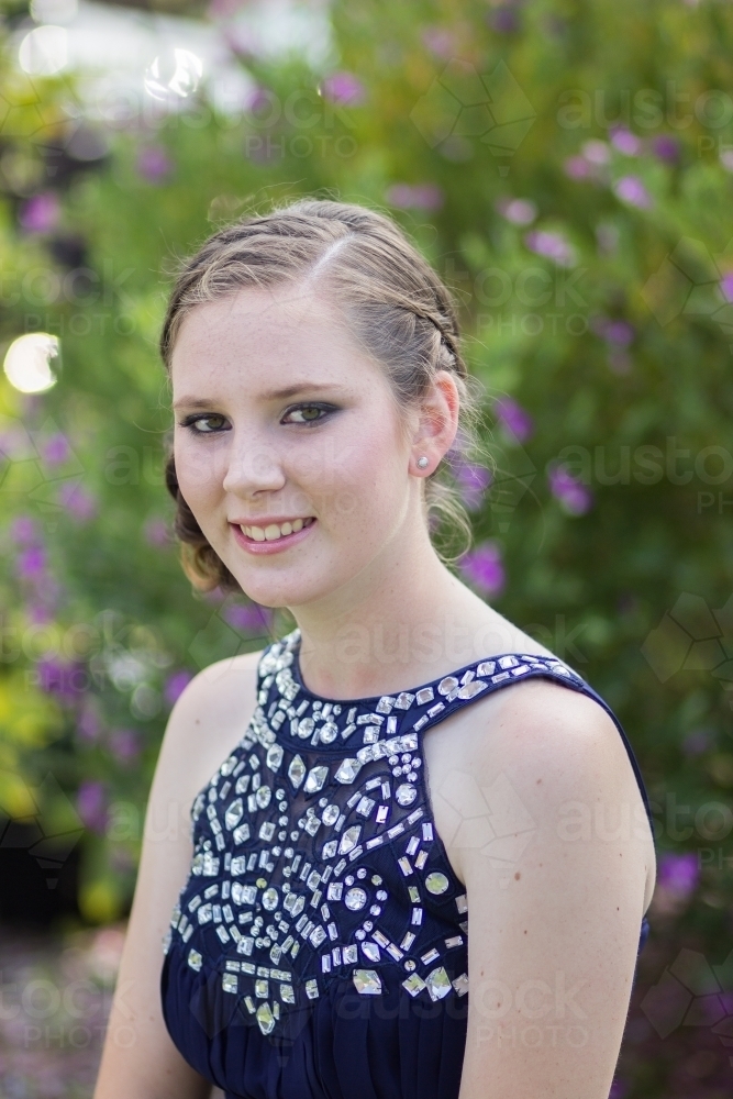 Image of Portrait of a beautiful teen girl ready for her year ten school formal Austockphoto