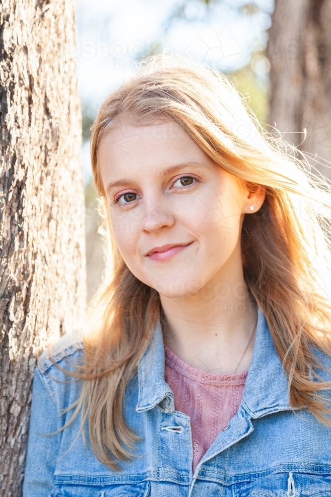 Portrait of a blond female teen outside - Australian Stock Image