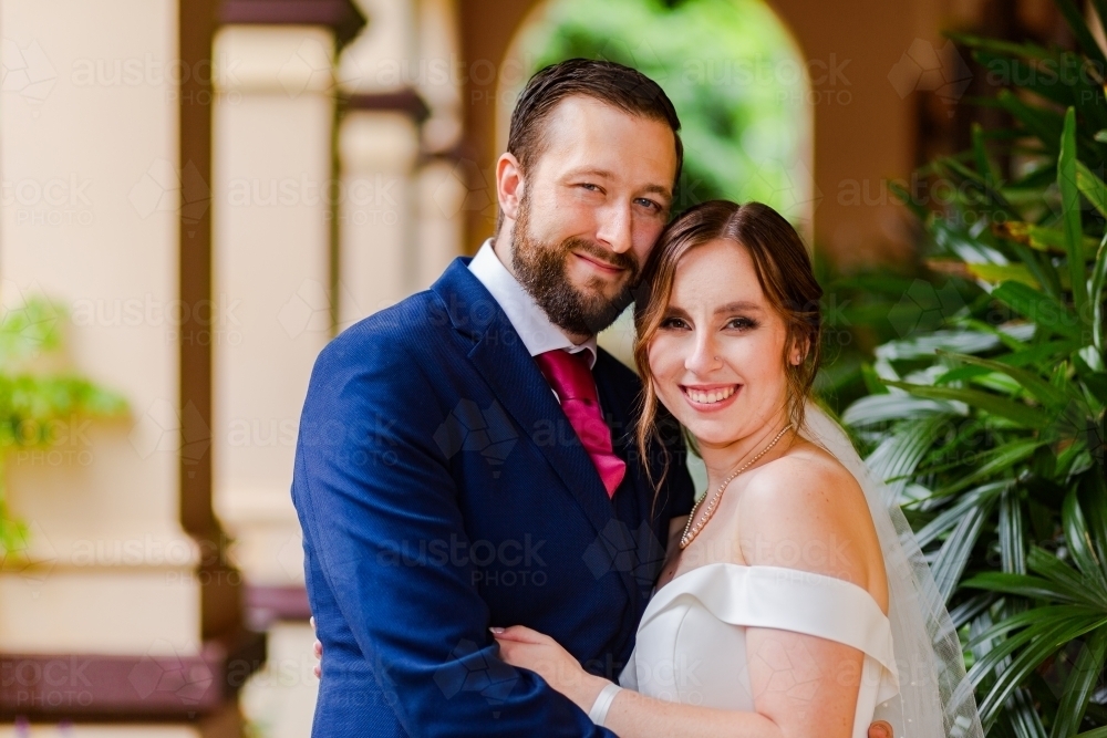Portrait of a happy Australian couple on their wedding day - Australian Stock Image
