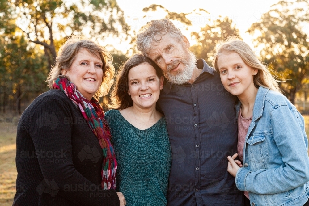 Portrait of a happy family, parents and teenage children - Australian Stock Image