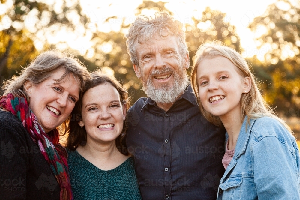 Portrait of a happy family, parents and teenage children - Australian Stock Image