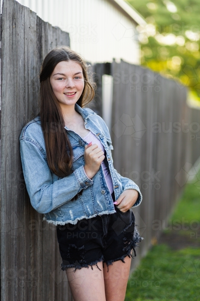 Portrait of a happy teen girl outside - Australian Stock Image