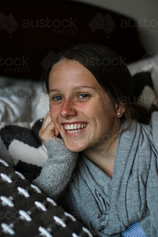 Portrait of a happy young teenage girl indoors : Austockphoto Portrait of a happy young teenage girl indoors - Australian Stock Image