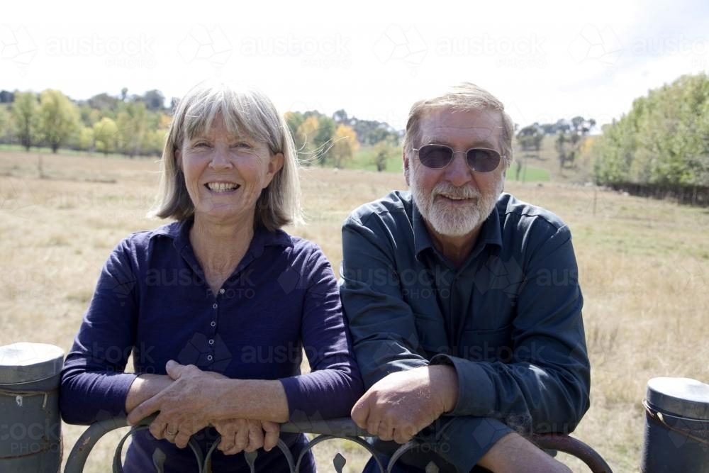 Portrait of a middle aged couple outside on a rural farm - Australian Stock Image